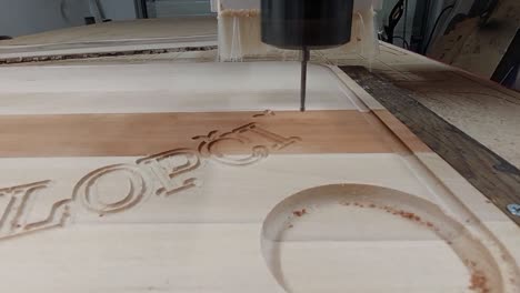 CNC-Router-Milling-Carving-Text-and-holes-to-wooden-cutting-board