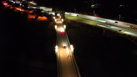 Colorado-Street-Bridge-in-Pasadena,-California---aerial-nighttime-flyover