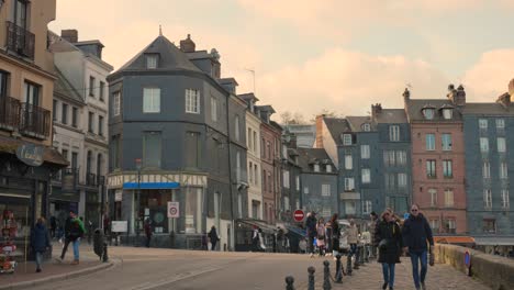 Scene-Of-People-In-The-Neighbourhood-Of-Waterfront-Village-In-Honfleur,-Normandy,-France
