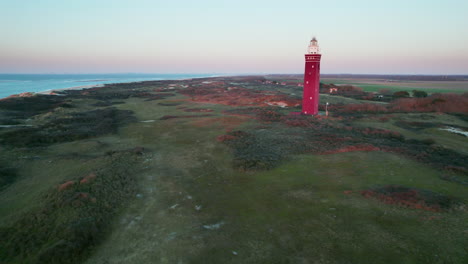 Drone-Approaching-On-The-Historical-Westhoofd-Lighthouse-Near-Ouddorp,-The-Netherlands