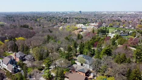 Slowly-orbiting-over-houses-in-Mississauga-on-an-overcast-spring-day