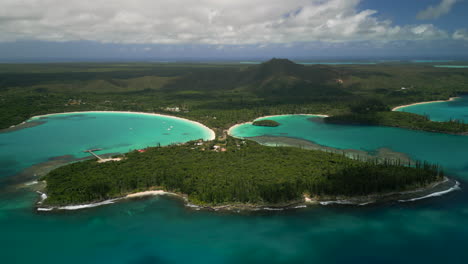 High-altitude-aerial-parallax-view-of-Kuto-Bay,-Presqu’île-de-Kuto,-and-Kanumera-Bay
