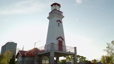 Close-up-of-a-lighthouse-at-sunrise-in-a-Mississauga-harbor