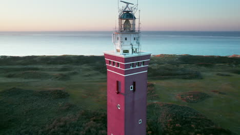 Aerial-Circling-Of-A-Brick-Lighthouse-In-Westhoofd-Near-Ouddorp,-The-Netherlands