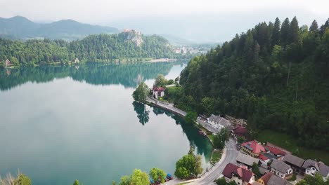 Aerial-view-of-Slovenia's-town-of-Bled-on-the-shoreline-of-Bled-Lake