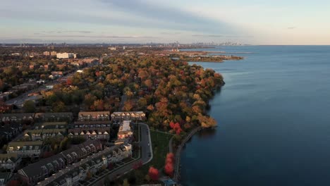 Drone-flying-over-townhouses-on-the-lakeshore-of-Mississauga-at-sunrise