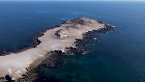 Isla-la-asuncion-desert-rocky-island-on-blue-sunny-day