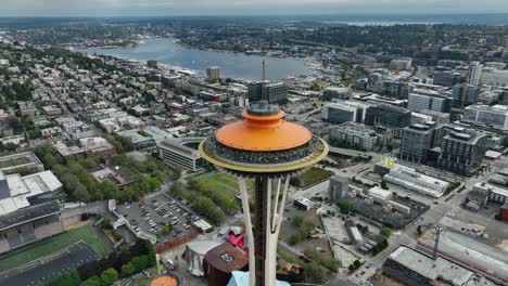Establishing-aerial-view-of-the-Space-Needle-towering-over-Lake-Union-and-the-surrounding-neighborhoods