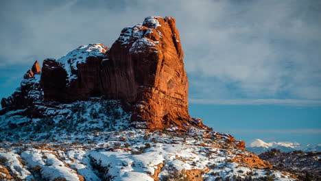 Timelapse,-Arches-National-Park-Utah-USA-in-Winter-Season,-Snow-Capped-Red-Rock-Formations-and-Sky