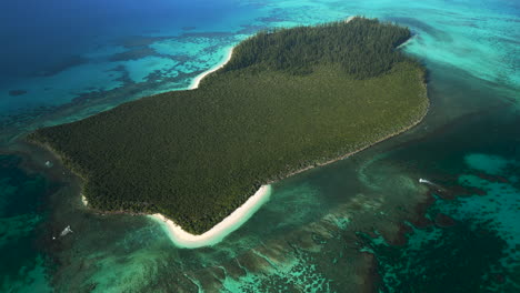 Brush-Island-is-a-deserted-islet-off-of-Kuto-Bay,-Isle-of-Pines---aerial-flyover