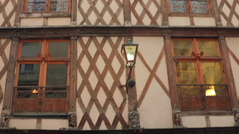 Angers,-France:-Tilt-down-shot-of-exterior-of-half-timbered-building-in-historic-center-of-Angers-Loire,-France-at-daytime