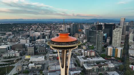 Orbiting-aerial-view-of-the-Space-Needle-at-sunset