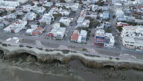 Beach-Town-in-Patagonia-Argentina,-Las-Grutas-Aerial-Street-View,-Cliff-Caves-Formation-by-Sea-Erosion,-Travel-and-Tourism-Latin-America