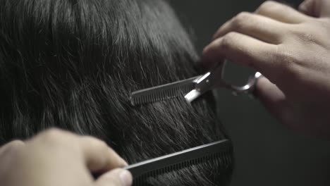Man-Gets-Modern-Haircut-At-Barber,-Combing-And-Cutting-Hair-Closeup