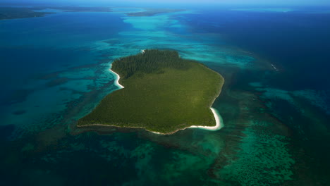 Brush-Island-is-part-of-the-archipelago-of-the-Isle-of-Pines,-New-Caledonia---aerial-orbit