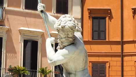 Close-up-of-the-statue-of-Neptune,-Fountain-of-the-Neptune-in-Piazza-Navona,-by-Giacomo-Della-Porta,-Rome,-Italy