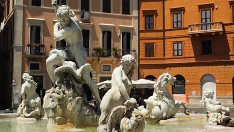 Close-up-of-the-statues-of-the-Fountain-of-the-Neptune-in-Piazza-Navona,-Rome,-Italy