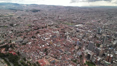 -Aerial---Flying-over-square-La-Candelaria,-Bogotá,-Colombia