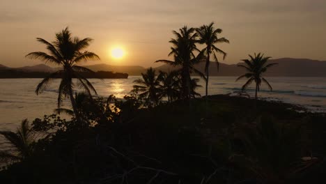 Small-island-of-Pirates,-El-Cayito-at-sunset,-Las-Galeras-in-Samana-peninsula