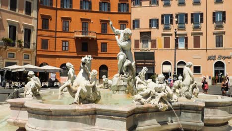Tourists-taking-pictures-of-the-Fountain-of-the-Neptune-in-Piazza-Navona,-Rome,-Italy