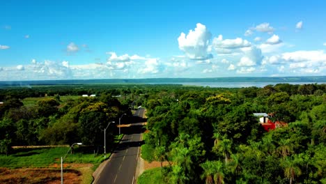 Stunning-Shot-Of-Aregua-Green-City-View-With-Famous-Ypacarai-Lake-In-Background,-Paraguay