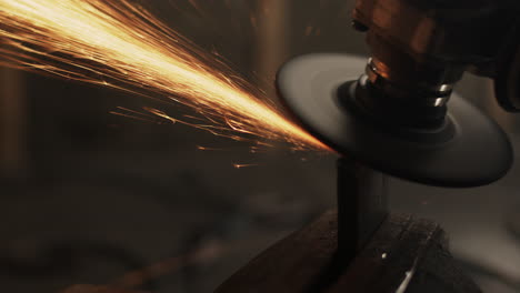 Working-on-metal-edge-with-angle-grinder-as-sparks-fly