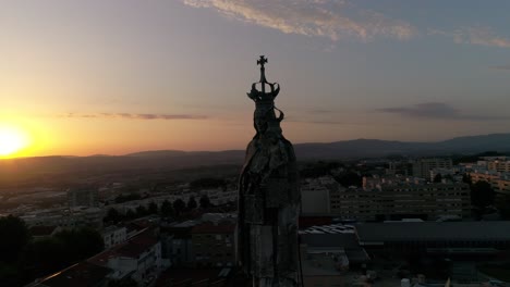 Church-Statue-at-Sunset-City-of-Braga-in-Portugal-Aerial-View