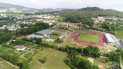 Flying-Over-Sports-Complex-in-City