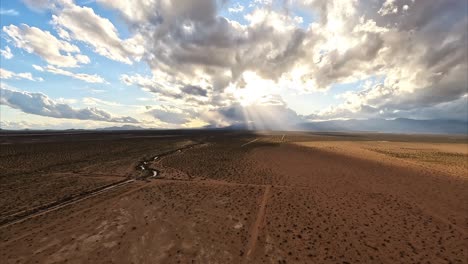 Calm-after-the-storm-with-Cache-Creek-in-the-Mojave-Desert-full-of-water-on-a-rare-deluge---aerial-view