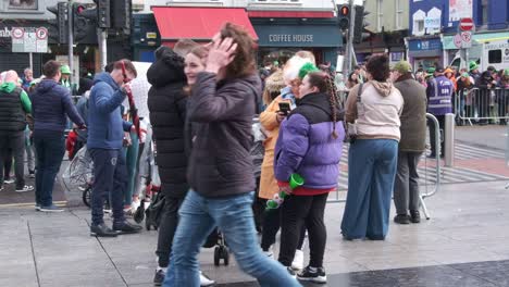 People-waiting-on-the-street-of-Cork-City-for-a-St
