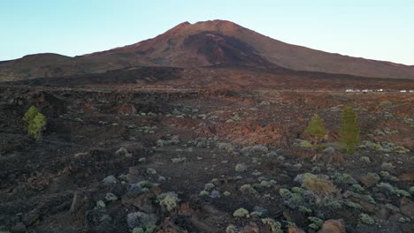 El-Teide-Volcano-peak-at-dusk,-tallest-mountain-in-Spanish-territory,-Tenerife-Canary-islands,-Aerial-dolly-left-low-shot