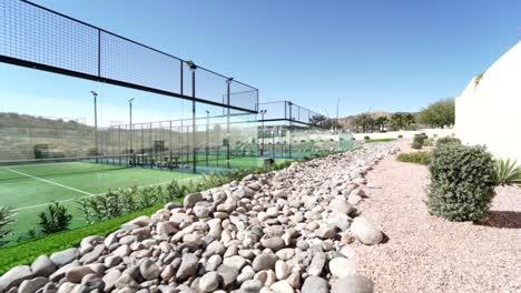 Low-dolly-shot-revealing-the-new-state-of-the-art-outdoor-padel-court-facilities