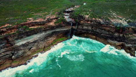Curracurrong-Falls,-Australia-Drone-Flys-over-Couple,-Stream-and-Waterfall
