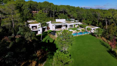 Slow-aerial-revealing-shot-of-a-luxury-villa-in-the-south-of-France-with-a-private-pool
