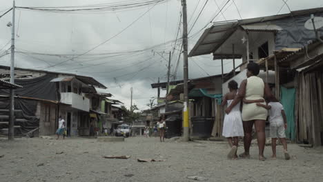 Traveling-at-a-poor-street-of-a-rough-neighborhood-in-Buenaventura,-at-Colombia's-Pacific-Coast