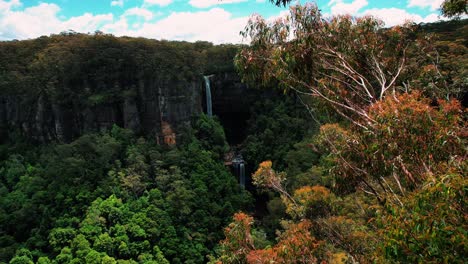 Belmore-Falls,-Australia,-Drone-of-Two-Tier-Waterfall-in-a-Dense-Forest