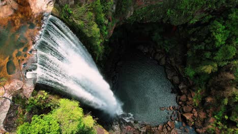 Belmore-Falls,-Australia,-Drone-Circles-Around-Cascading-Waterfall