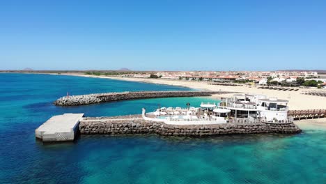 Aerial-View-Of-Bikini-Beach-Club-And-Breakwater-In-Sal-Cape-Verde
