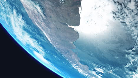 Argentinien-Südamerika-Aus-Dem-Weltraum-Mit-Langsam-Rotierender-Erde-Mit-Blick-Aus-Der-Umlaufbahn-Mit-Dynamischer-Wolkenseeatmosphäre-Und-Starker-Sonnenreflexion-Auf-Dem-Ozeanmeer