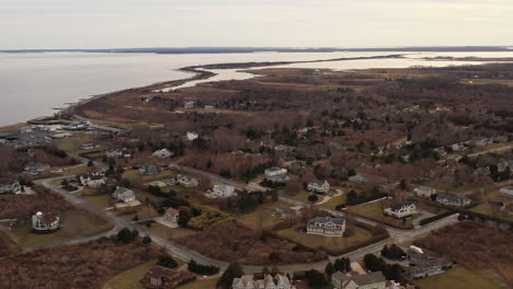 an-aerial-view-over-the-east-end-neighborhood-of-Orient-Point,-Long-Island-at-sunset