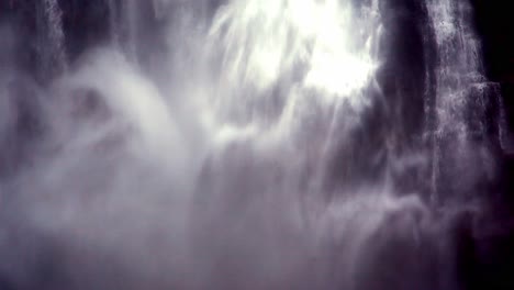 Water,-spray-and-mist-pour-down-the-side-of-a-mountain-in-this-powerful-waterfall---close-up-isolated