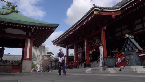 Low-angle-view-of-Senso-ji-shrine-in-Asakusa-with-few-people-walking