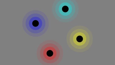 Four-colorful-circles-revolving-around-center-axis