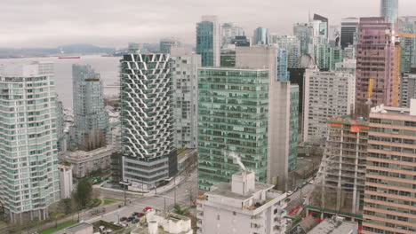 Aerial-flying-over-skyscrapers-in-downtown-Vancouver