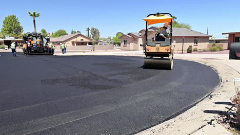 Road-roller-paves-asphalt-road,-Green-Valley,-Arizona