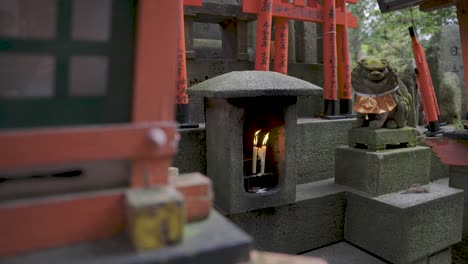 Candles-Burning-at-Fushimi-Inari-Taisha,-Kyoto-Japan