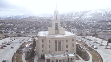 Payson-Utah-Temple,-Church-of-Latter-day-Saints-in-snowy-winter-Utah,-aerial