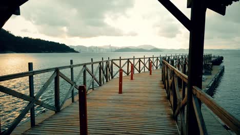 Walking-on-a-pier-during-a-cloudy-day