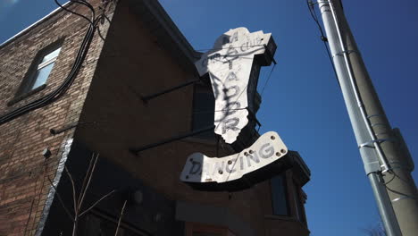 Wide-pan-of-historic-Matador-Club-sign