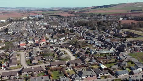Aerial-view-of-the-Scottish-town-of-Laurencekirk-on-a-sunny-spring-day,-Aberdeenshire,-Scotland